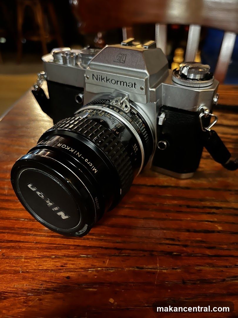 Nikkormat camera with Nikon lens