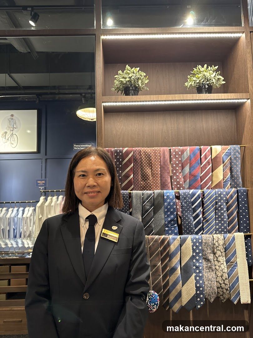 Woman in Suit with Ties Display