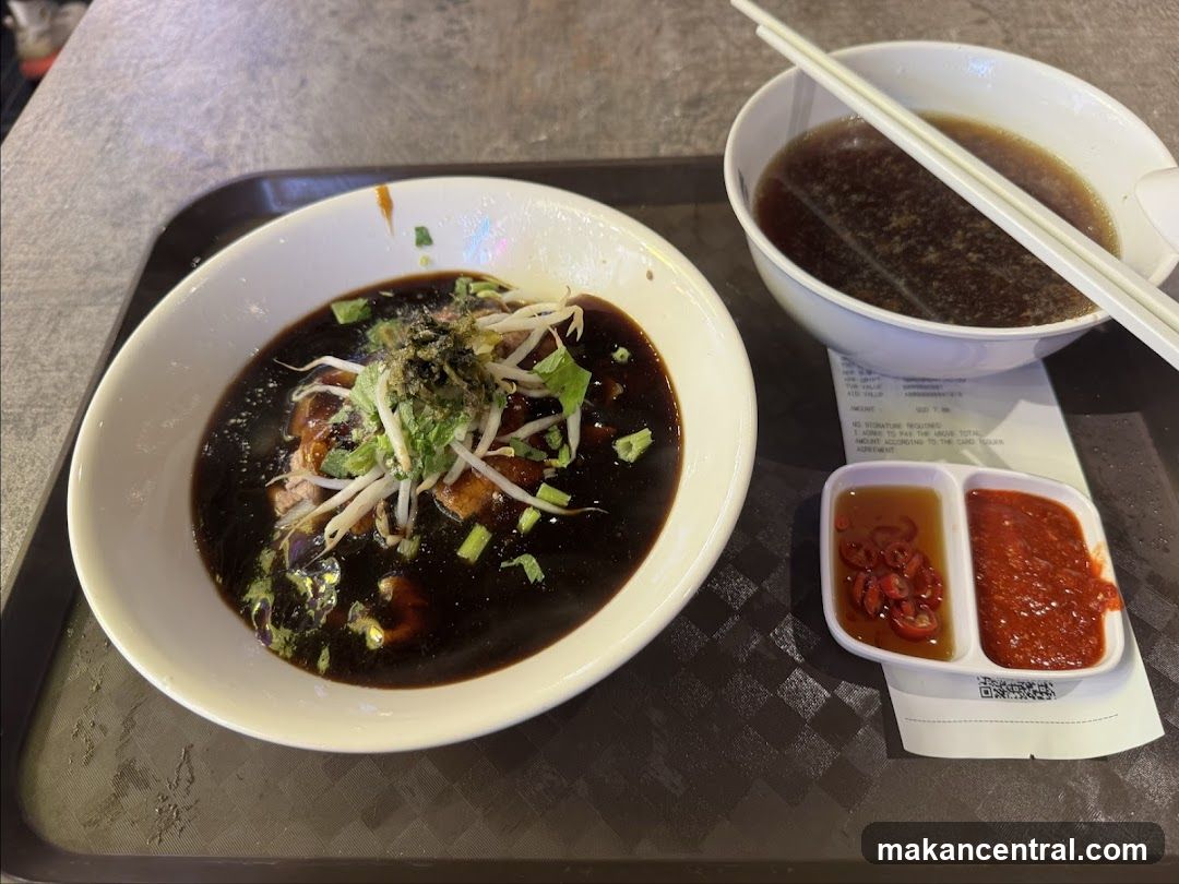 Noodles with broth and condiments