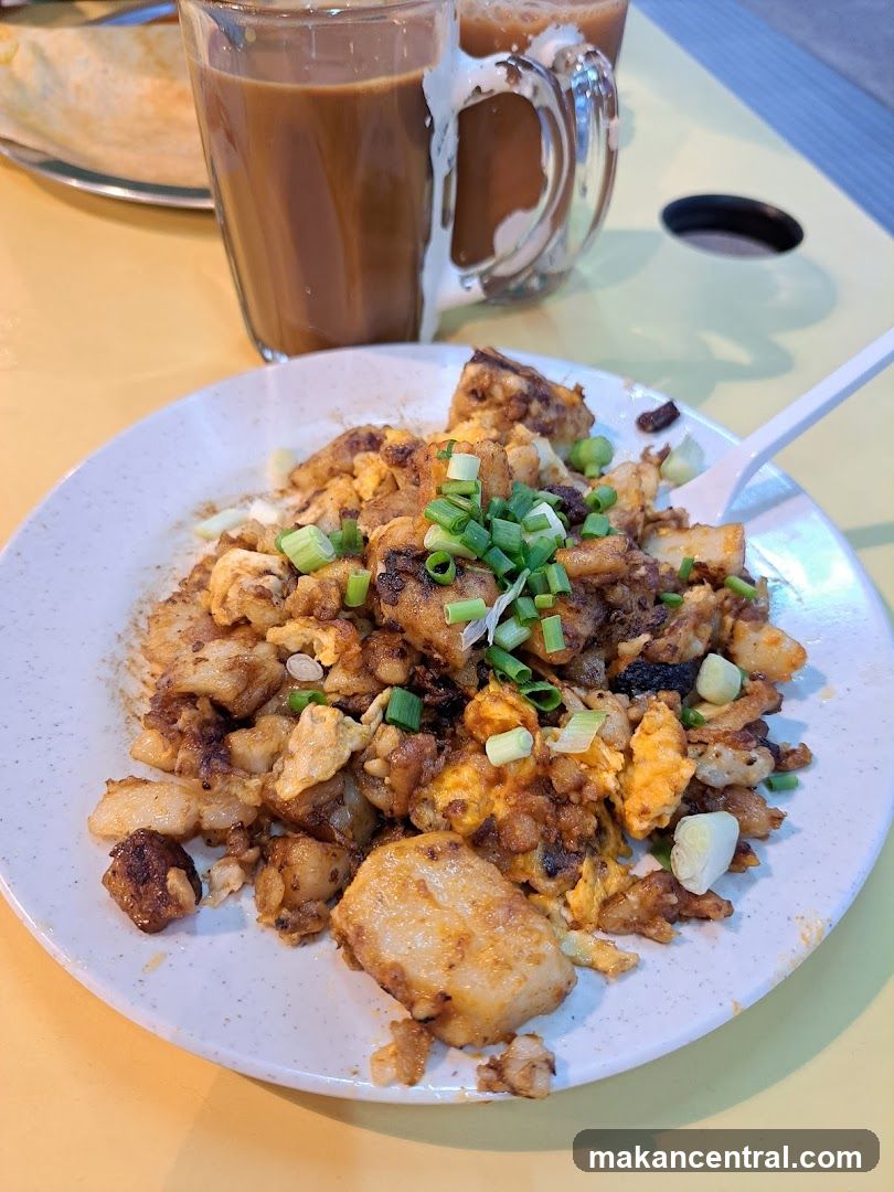 Fried Carrot Cake with Eggs and Scallions