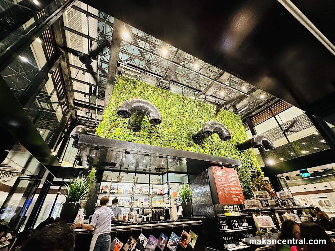 Interior of a modern cafe with a living wall