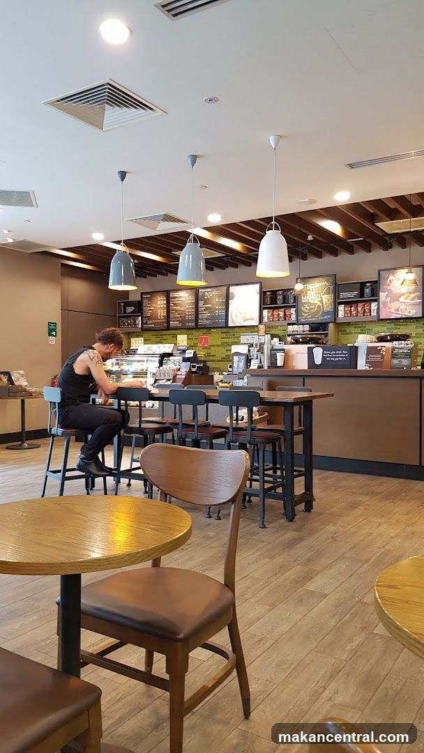 Cafe Interior with Seated Customer