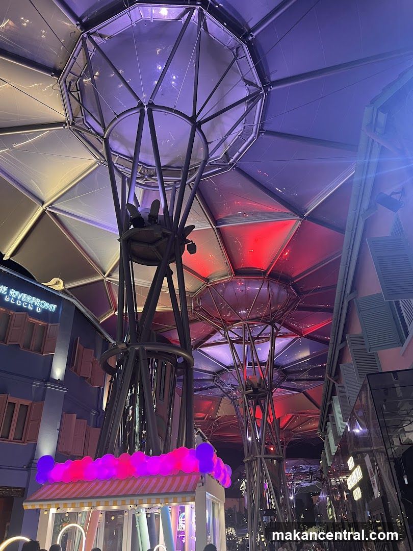 Outdoor dining area with illuminated canopy