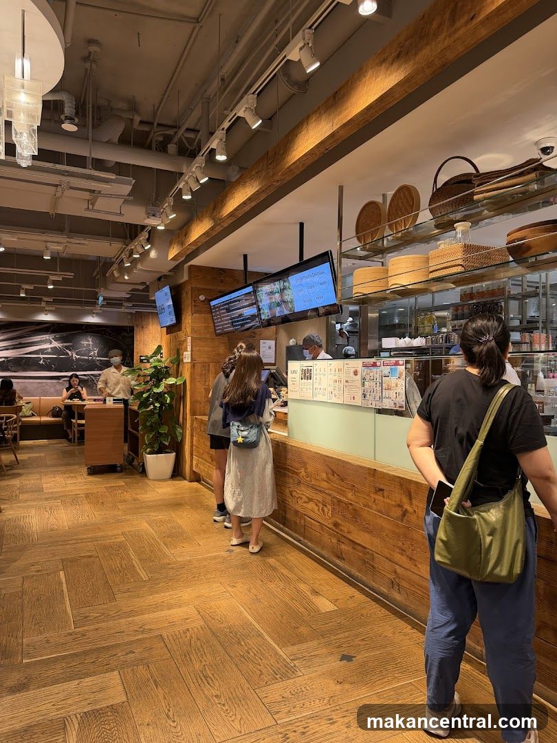 Customers in Line at a Food Establishment