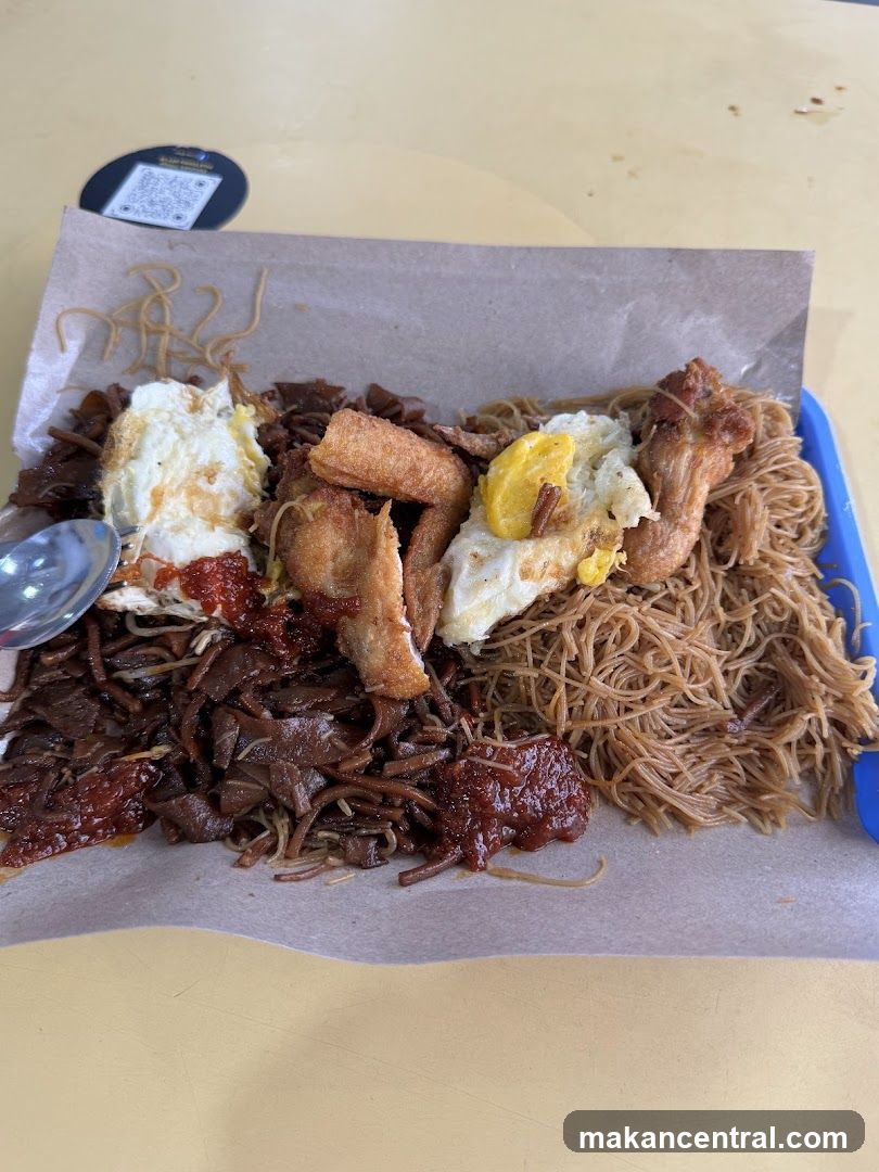 Nasi Lemak with Fried Chicken and Eggs