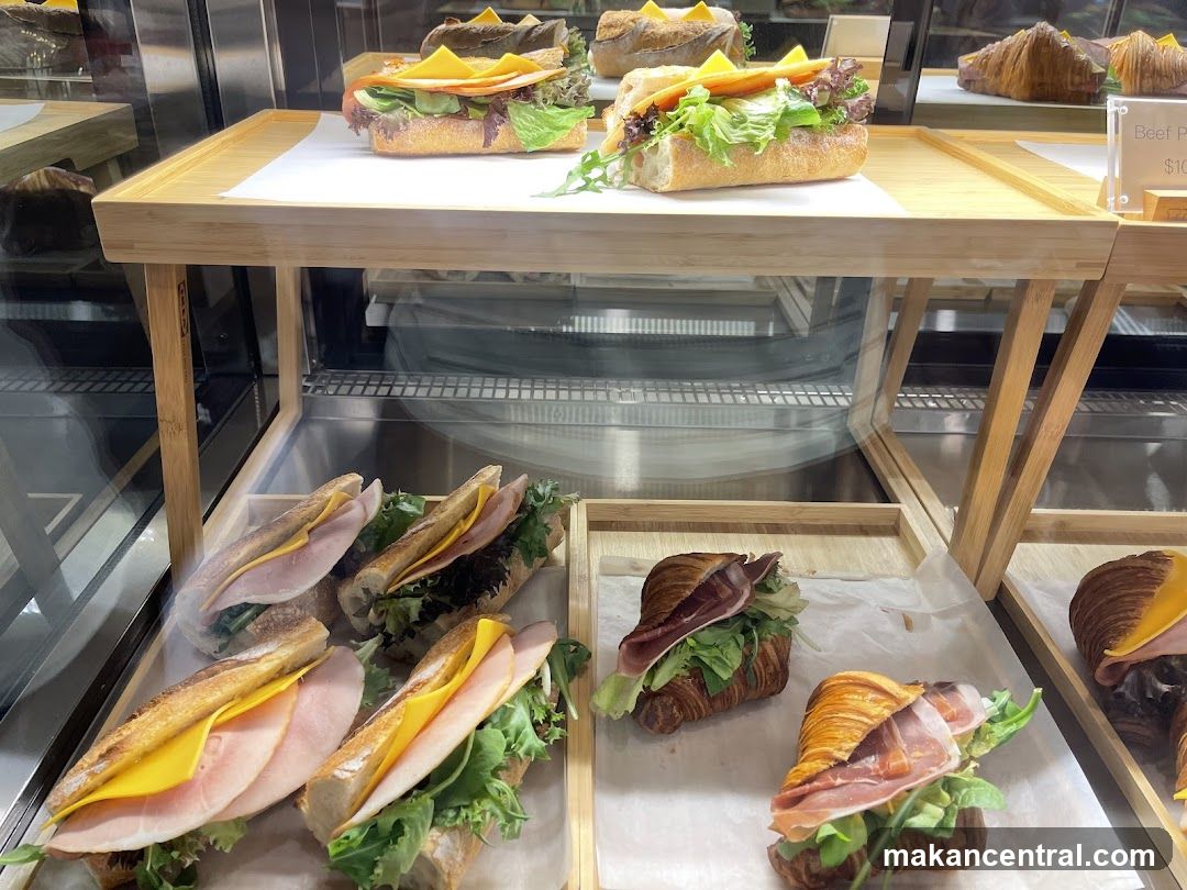 Sandwiches and Croissants in Display Case