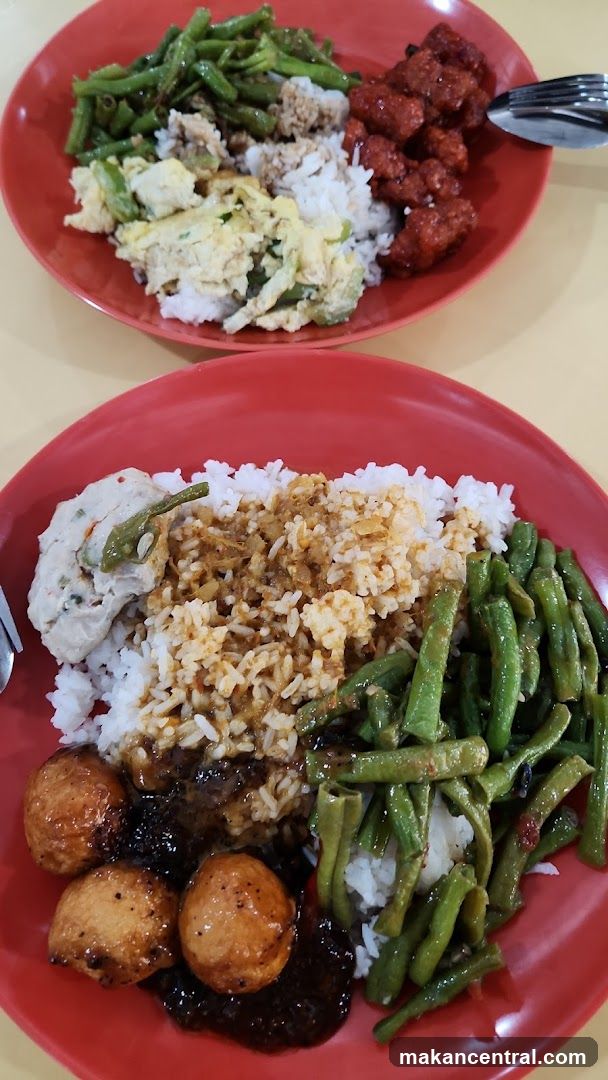 Two Plates of Rice with Side Dishes