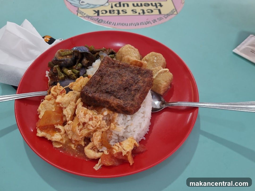 Plate of Rice with Various Toppings