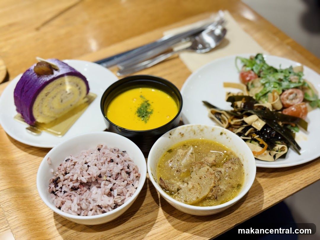 Meal with Purple Roll Cake and Soup