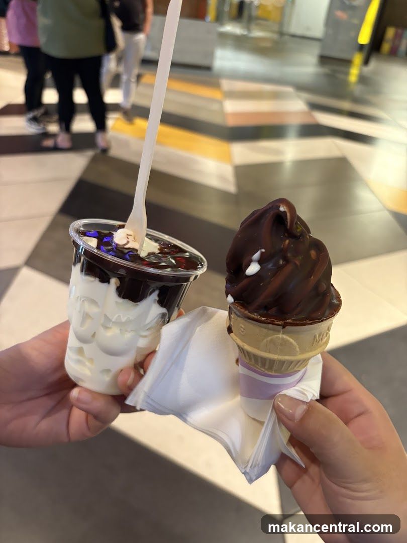 Two hands holding ice cream desserts