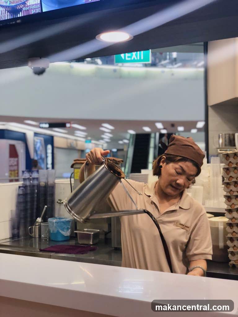 Barista Pouring Drink