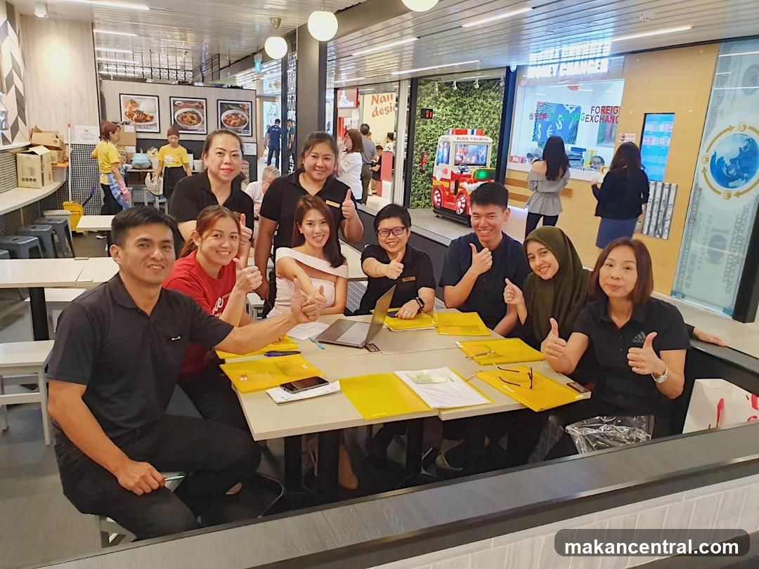 Group of people giving thumbs up