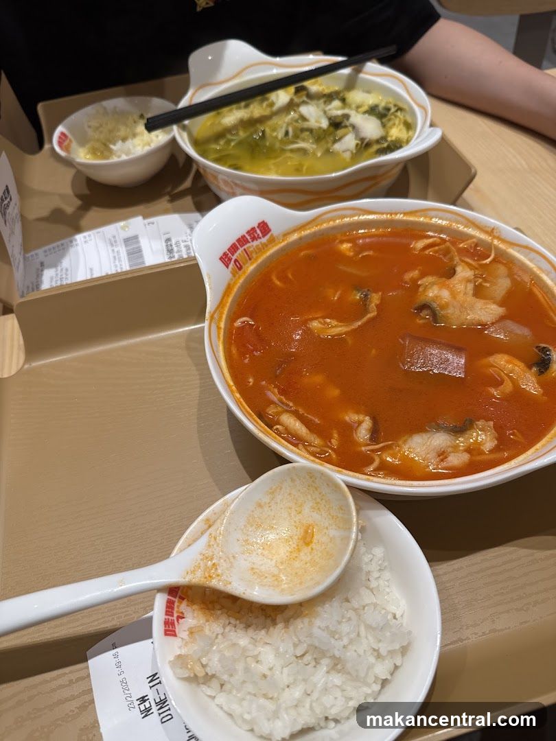 Two bowls of soup with rice