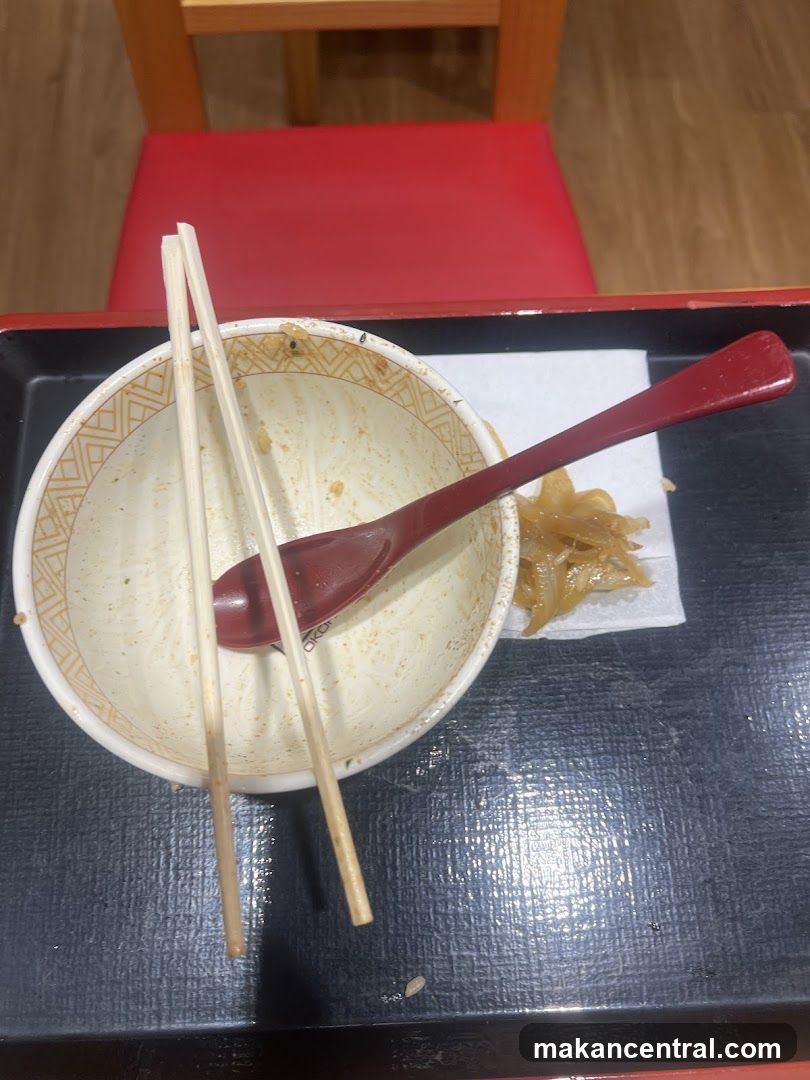 Empty Bowl with Chopsticks and Spoon