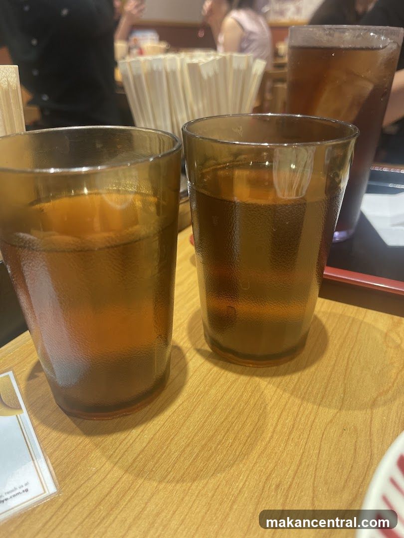 Two glasses of iced tea on a table