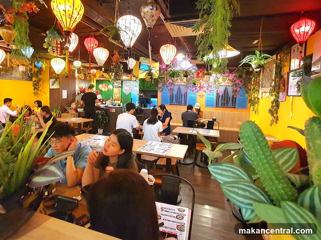 Restaurant Interior with Lanterns and Plants