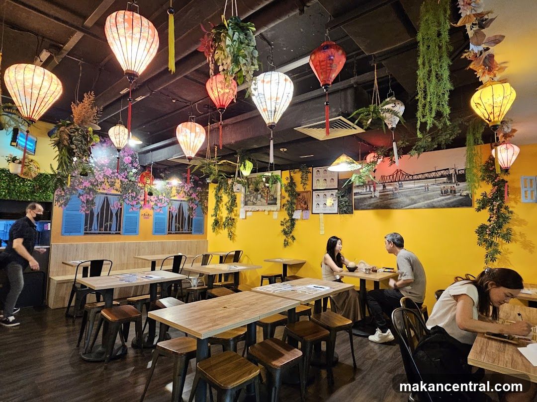 Restaurant Interior with Lanterns and Yellow Walls