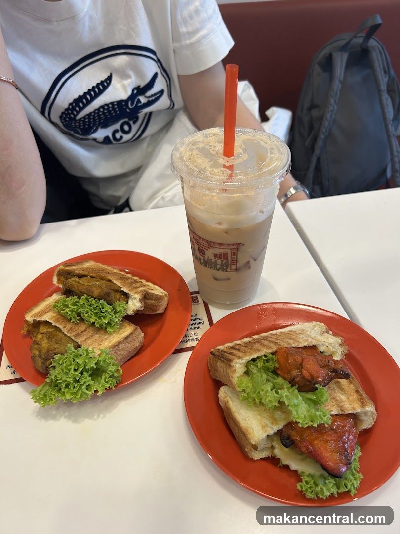 Two sandwiches and a drink