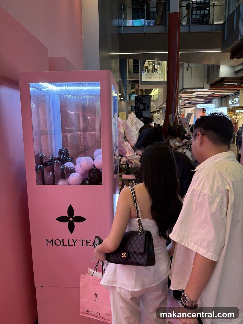 Claw Machine with Pink Branding