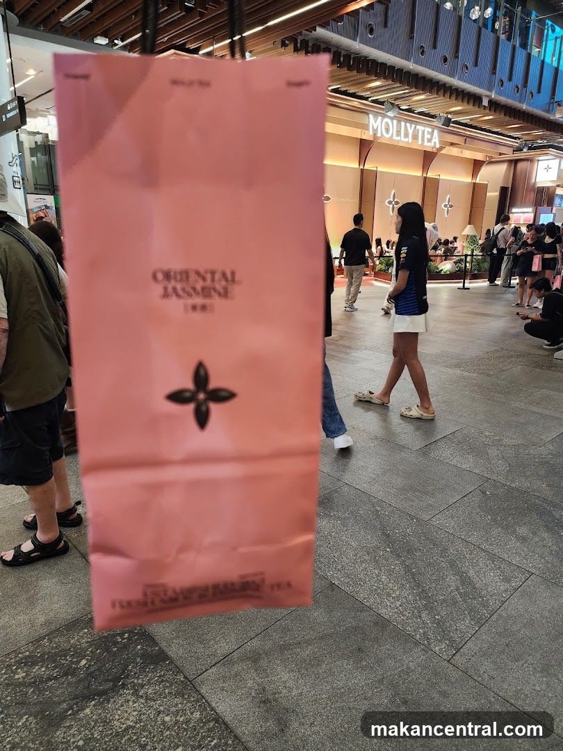 Pink shopping bag with tea branding