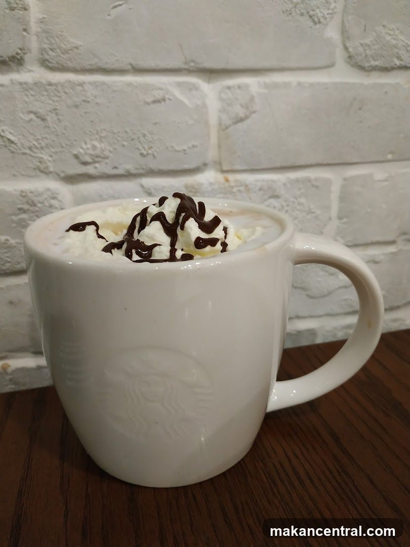 Hot Beverage with Whipped Cream and Chocolate Drizzle