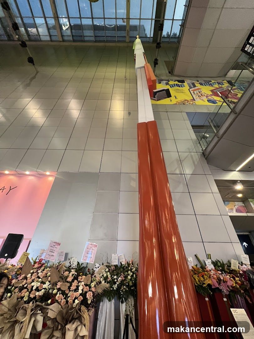 Tall Sculpture and Floral Arrangements