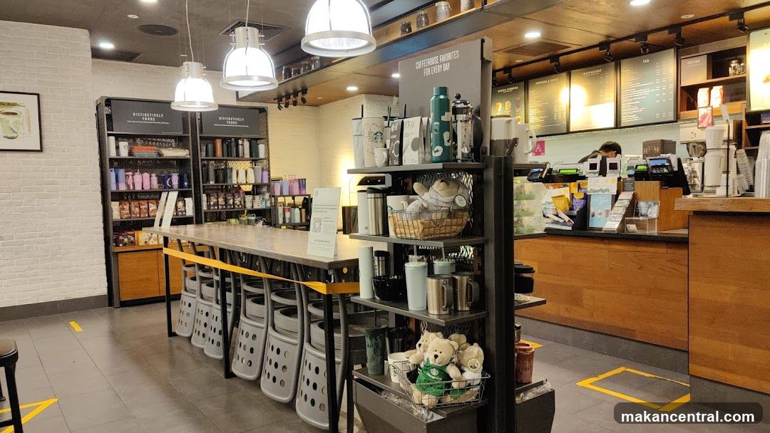 Coffee shop interior with merchandise and menu boards