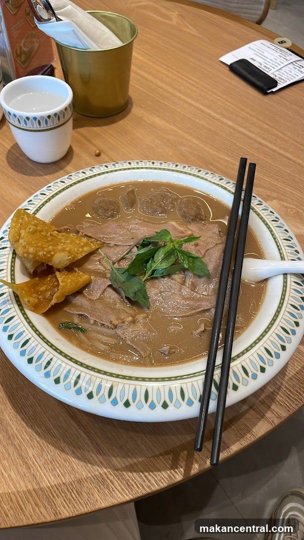 Bowl of Noodles with Meat and Wontons