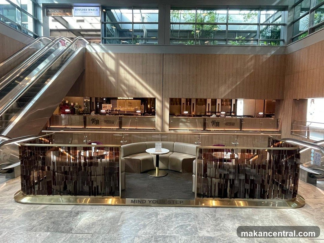 Interior of a modern building with escalators and seating area