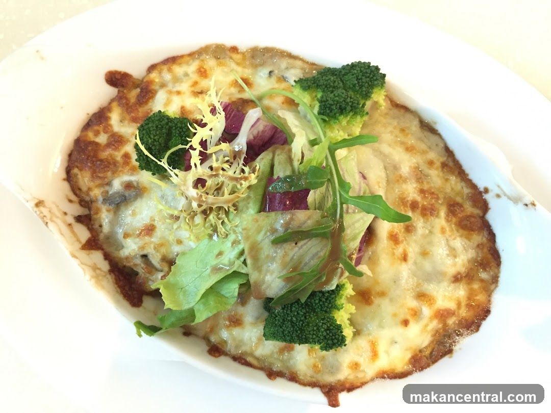 Baked Dish with Broccoli and Salad