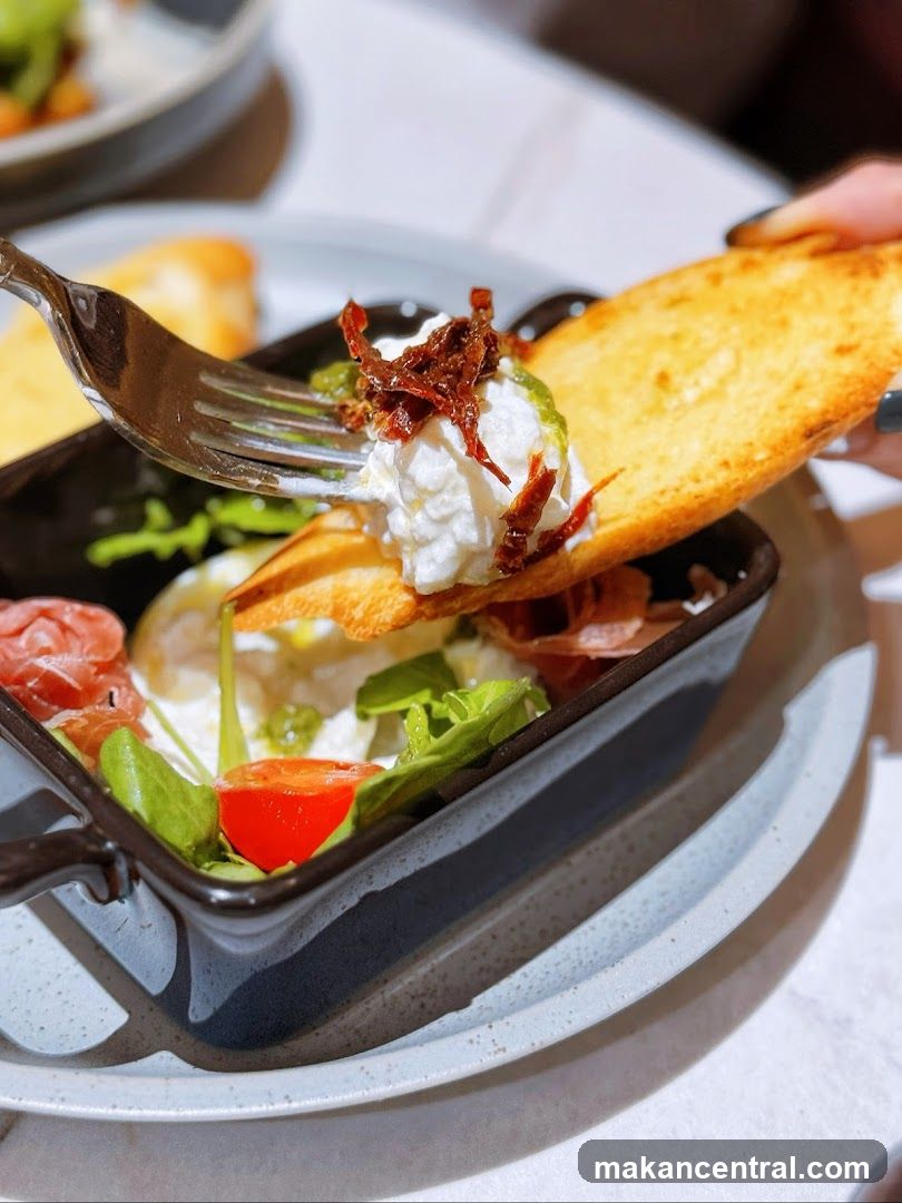 Burrata with Sun-Dried Tomatoes and Prosciutto