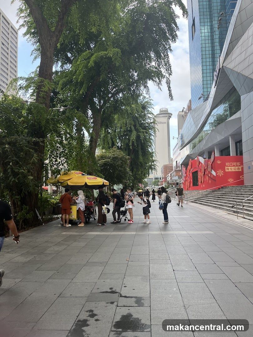 Street scene with ice cream cart and modern buildings