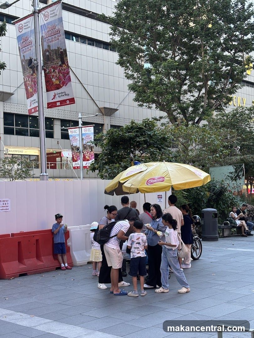 People at an outdoor ice cream stand