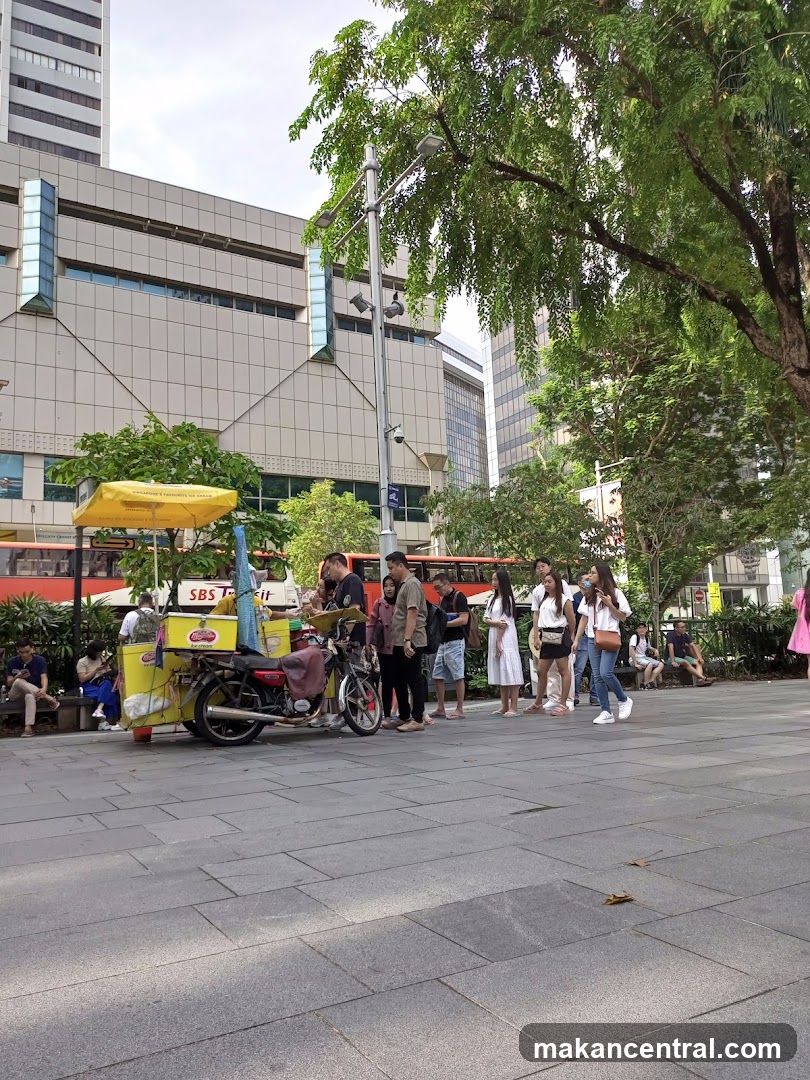 Street food cart with customers