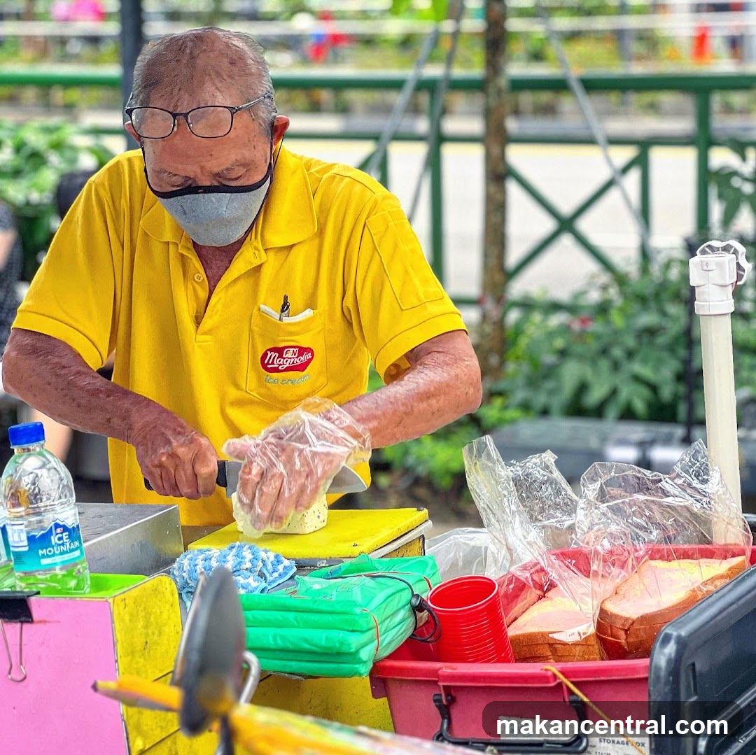 Man preparing food at a stall
