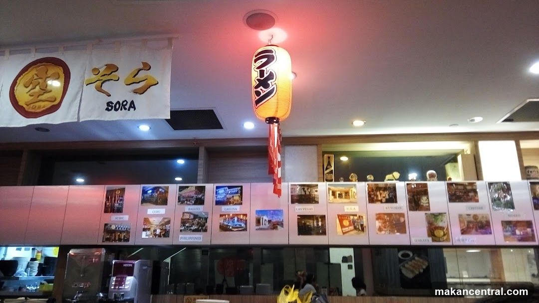 Restaurant Interior with Japanese Lantern and Photos