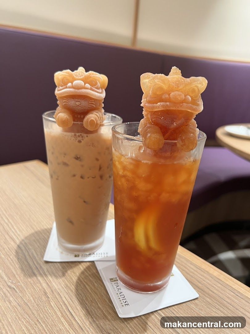Two iced drinks with decorative ice cubes
