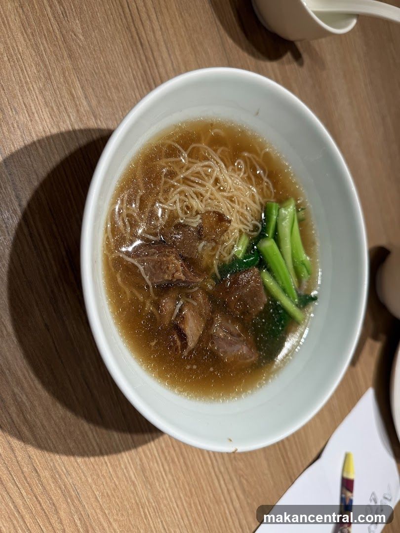 Bowl of Noodles with Beef and Greens