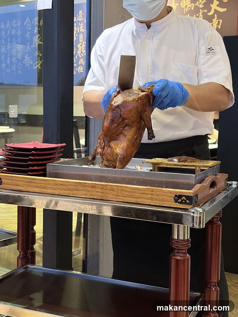 Chef Carving Roasted Duck