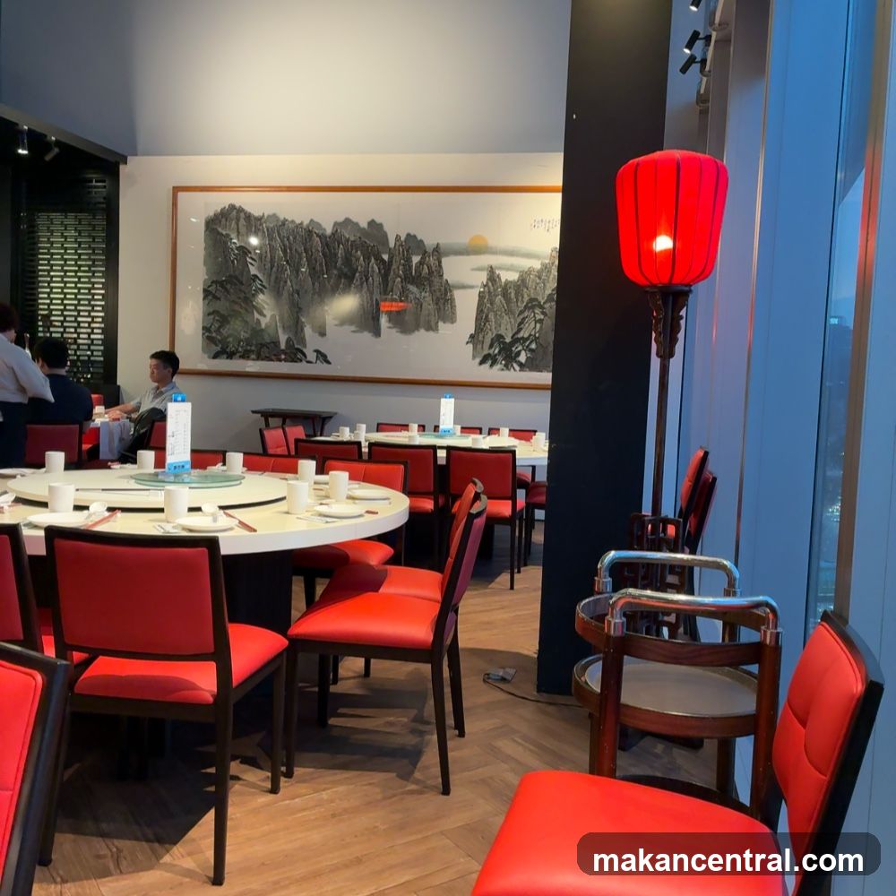 Restaurant Interior with Red Chairs and Chinese Artwork