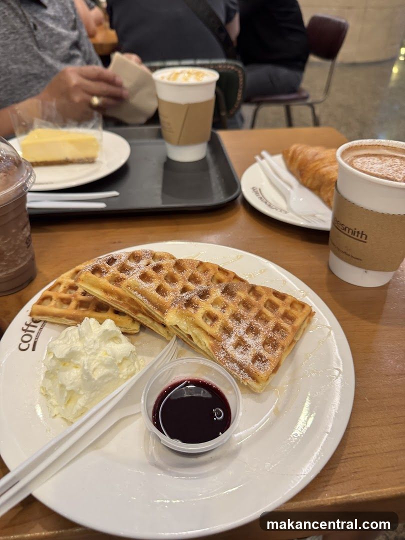 Waffles with Whipped Cream and Berry Sauce