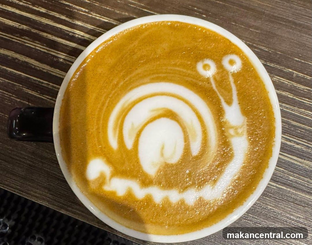 Coffee with Snail Latte Art