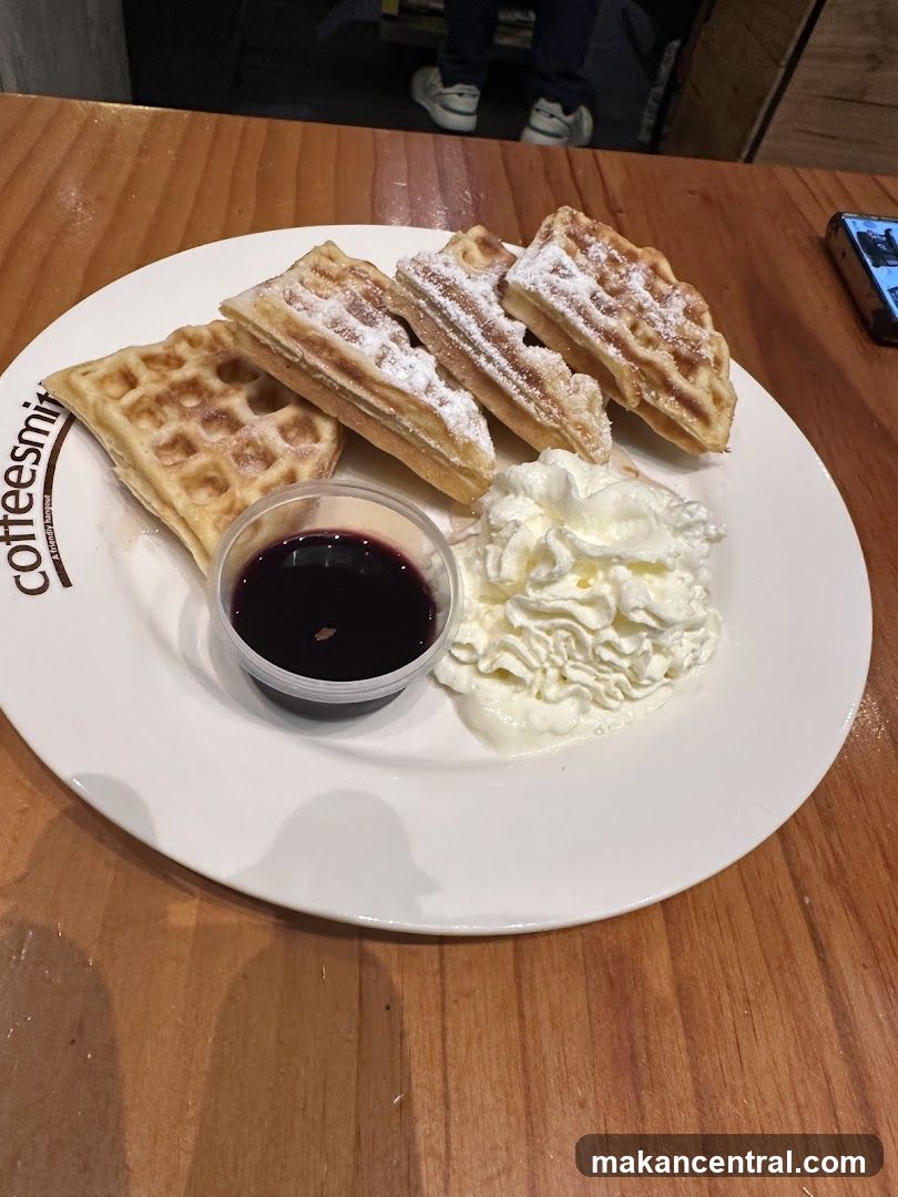 Waffles with Whipped Cream and Berry Compote