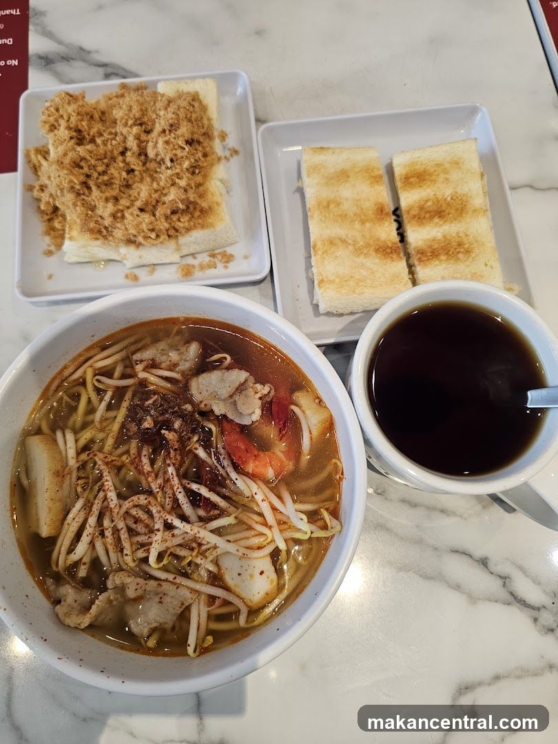 Noodle Soup with Toast and Coffee