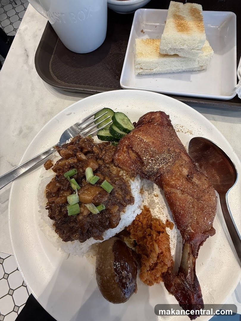 Rice dish with fried chicken and toast
