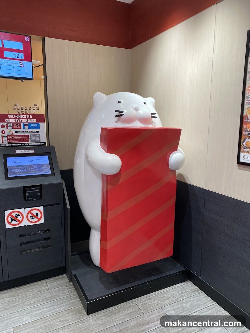 Cat Mascot with Red Object
