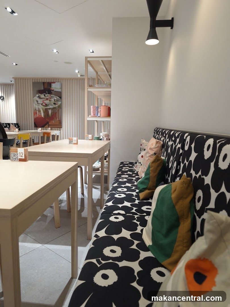Modern Cafe Interior with Floral Seating