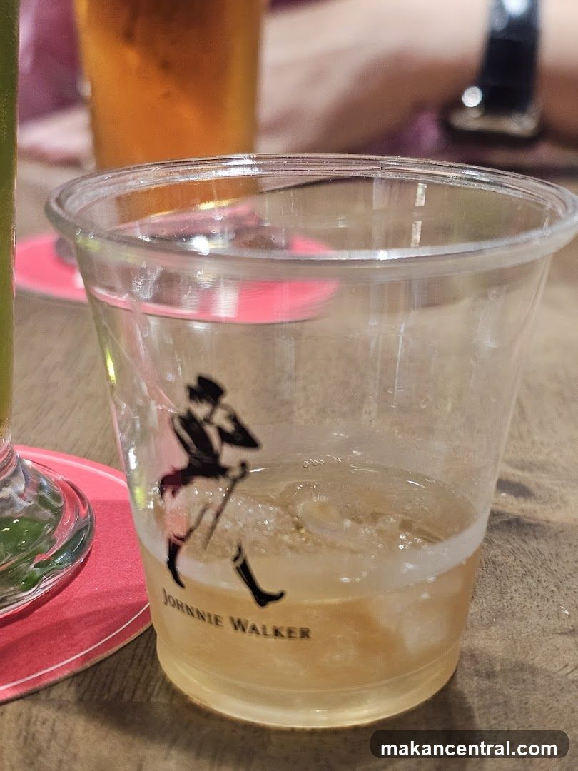 Johnnie Walker branded cup with drink