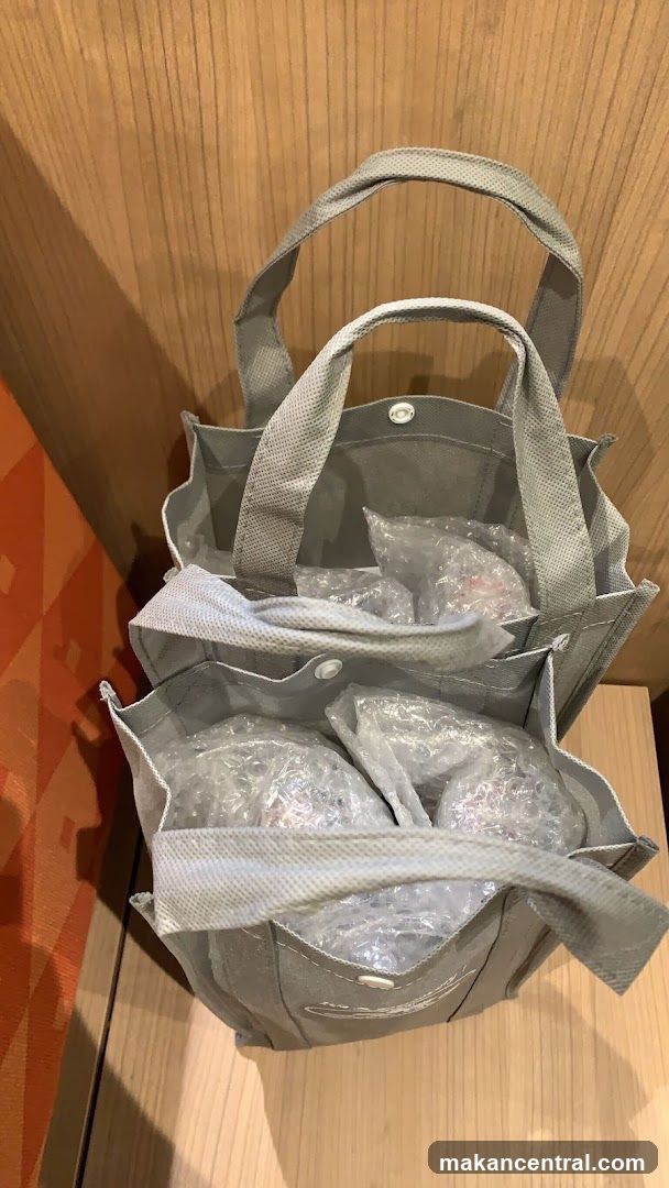 Gray tote bag with items