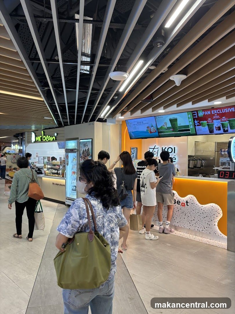 People queuing at a beverage stall